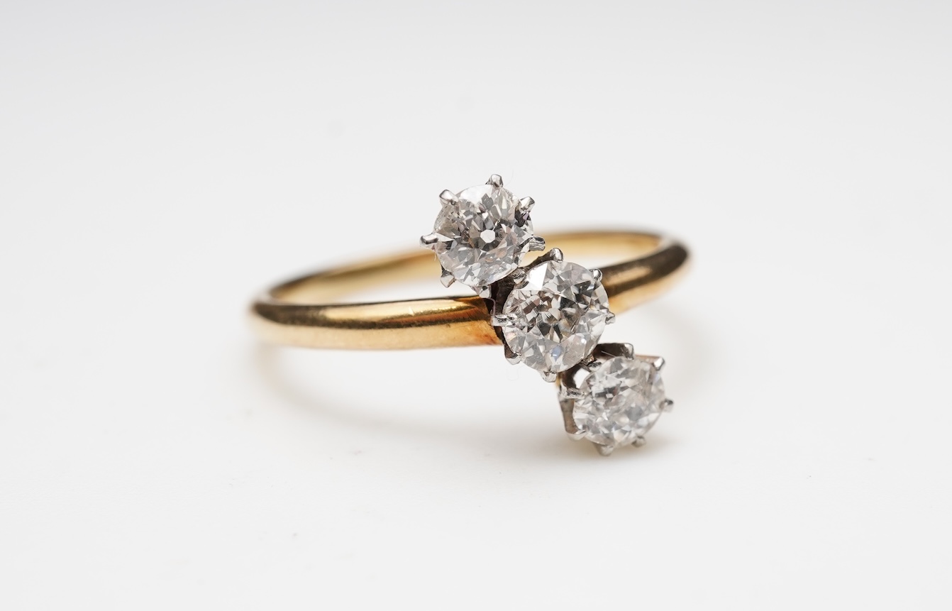 A diamond three-stone ring, early 20th century